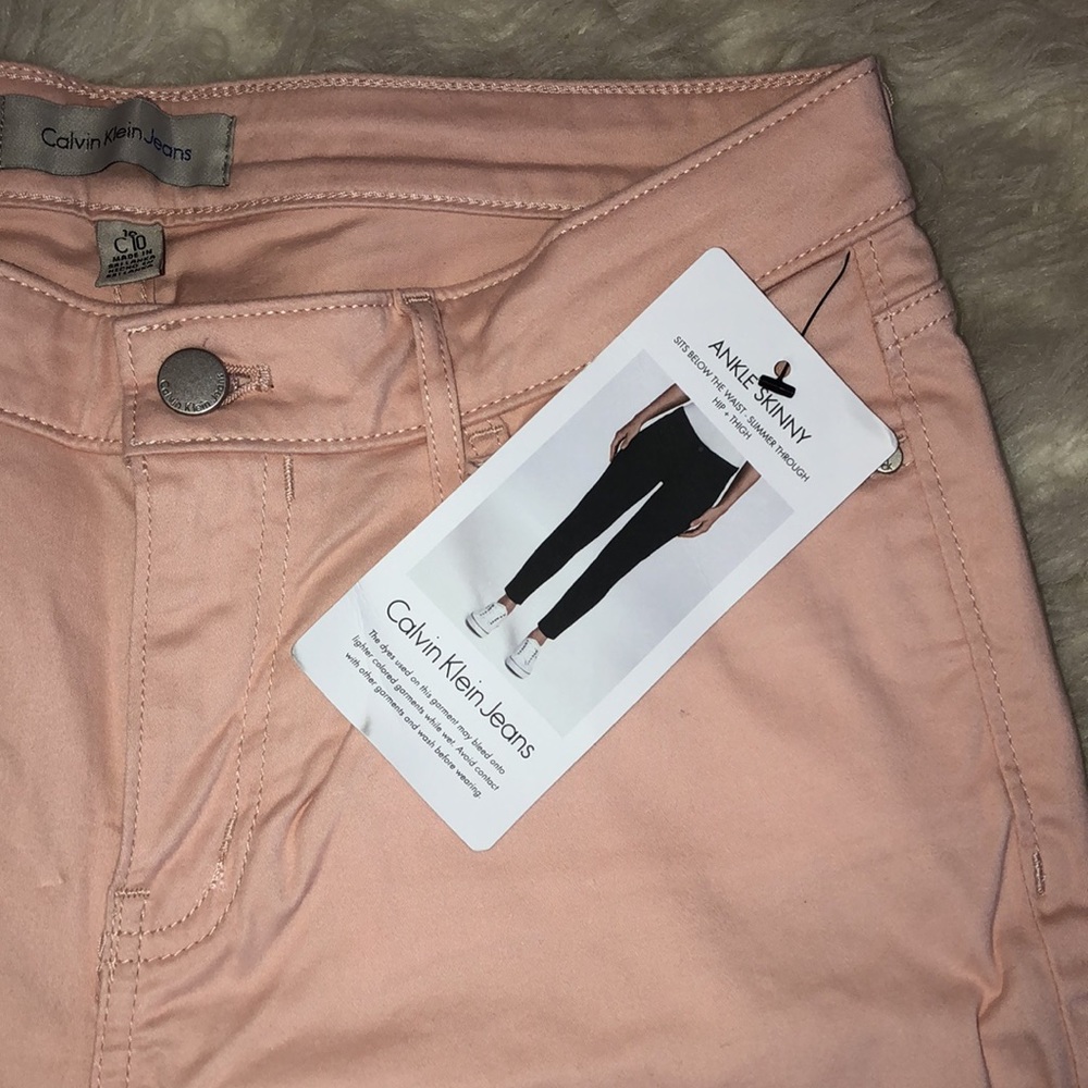 Light pink CK ankle skinny jeans